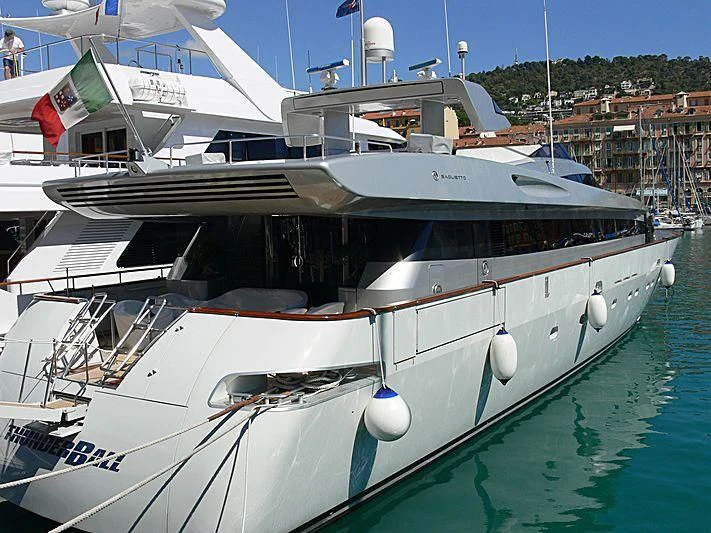 a boat docked at a pier aboard THUNDERBALL I Yacht for Sale