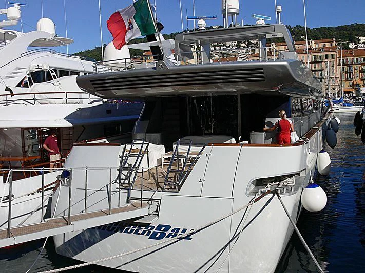 a boat docked at a pier aboard THUNDERBALL I Yacht for Sale