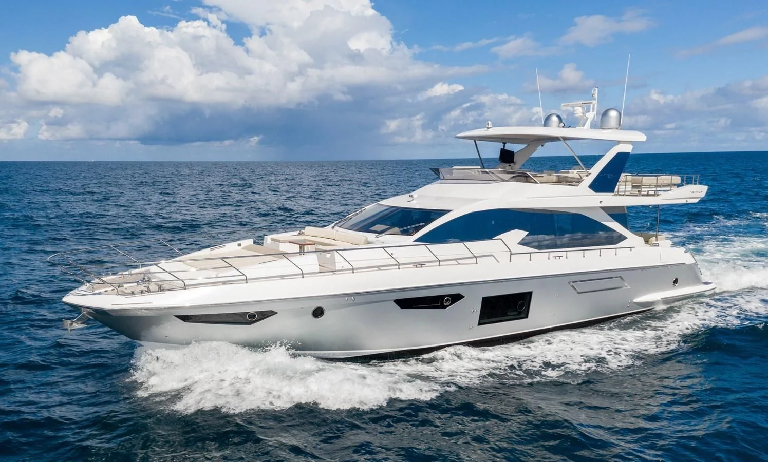 a white yacht in the water aboard BAR BAT VIA Yacht for Sale