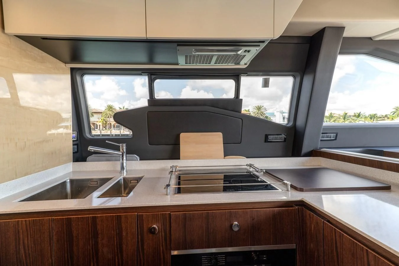 a kitchen with a large window aboard BAR BAT VIA Yacht for Sale
