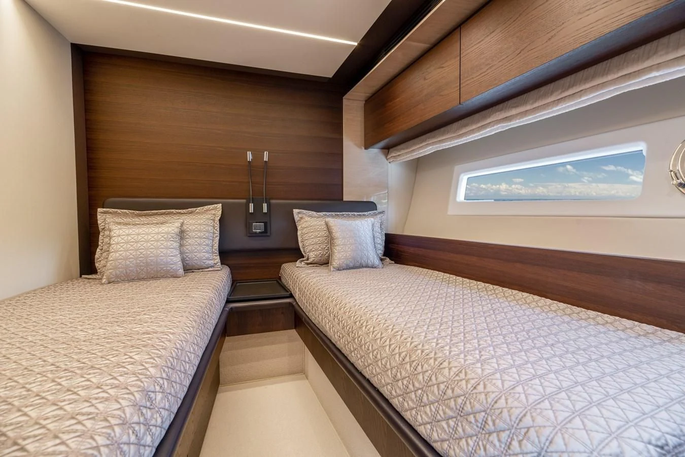 a room with two beds aboard BAR BAT VIA Yacht for Sale