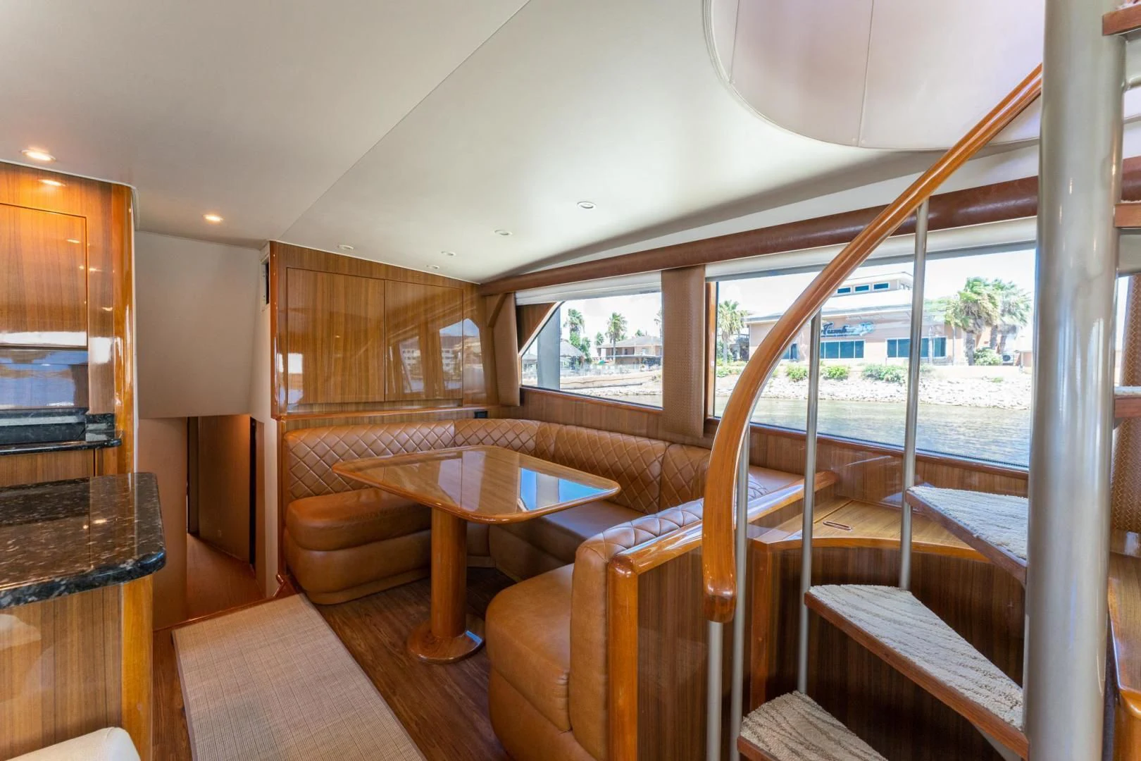 a room with a table and chairs aboard SALT STRUK Yacht for Sale