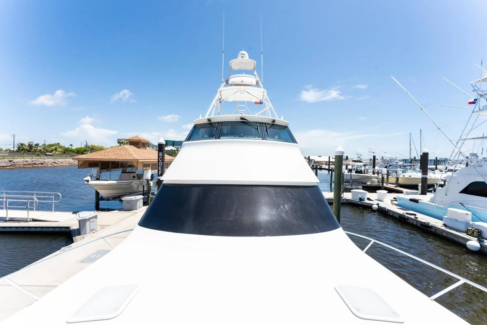 a large white boat docked aboard SALT STRUK Yacht for Sale