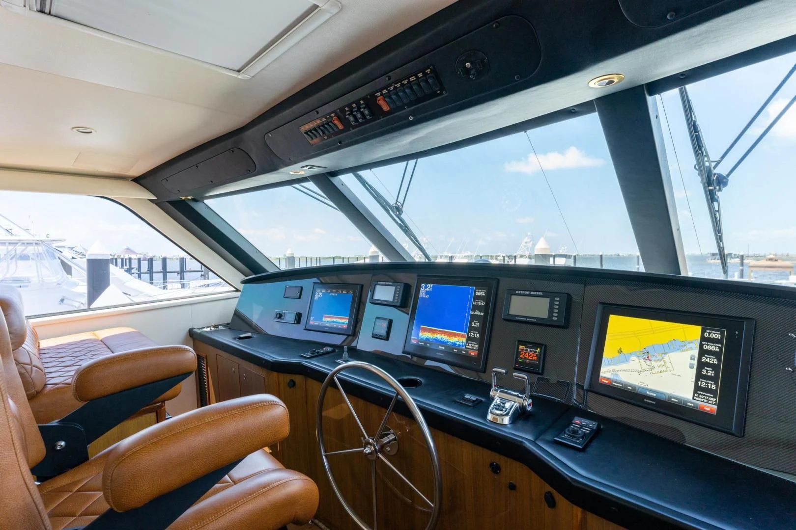 inside of a vehicle with many monitors and screens aboard SALT STRUK Yacht for Sale