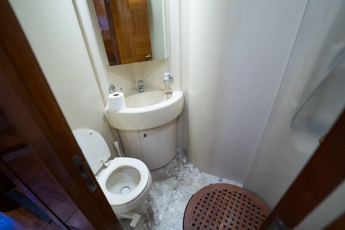 a bathroom with a toilet and sink aboard 80 CARAT Yacht for Sale