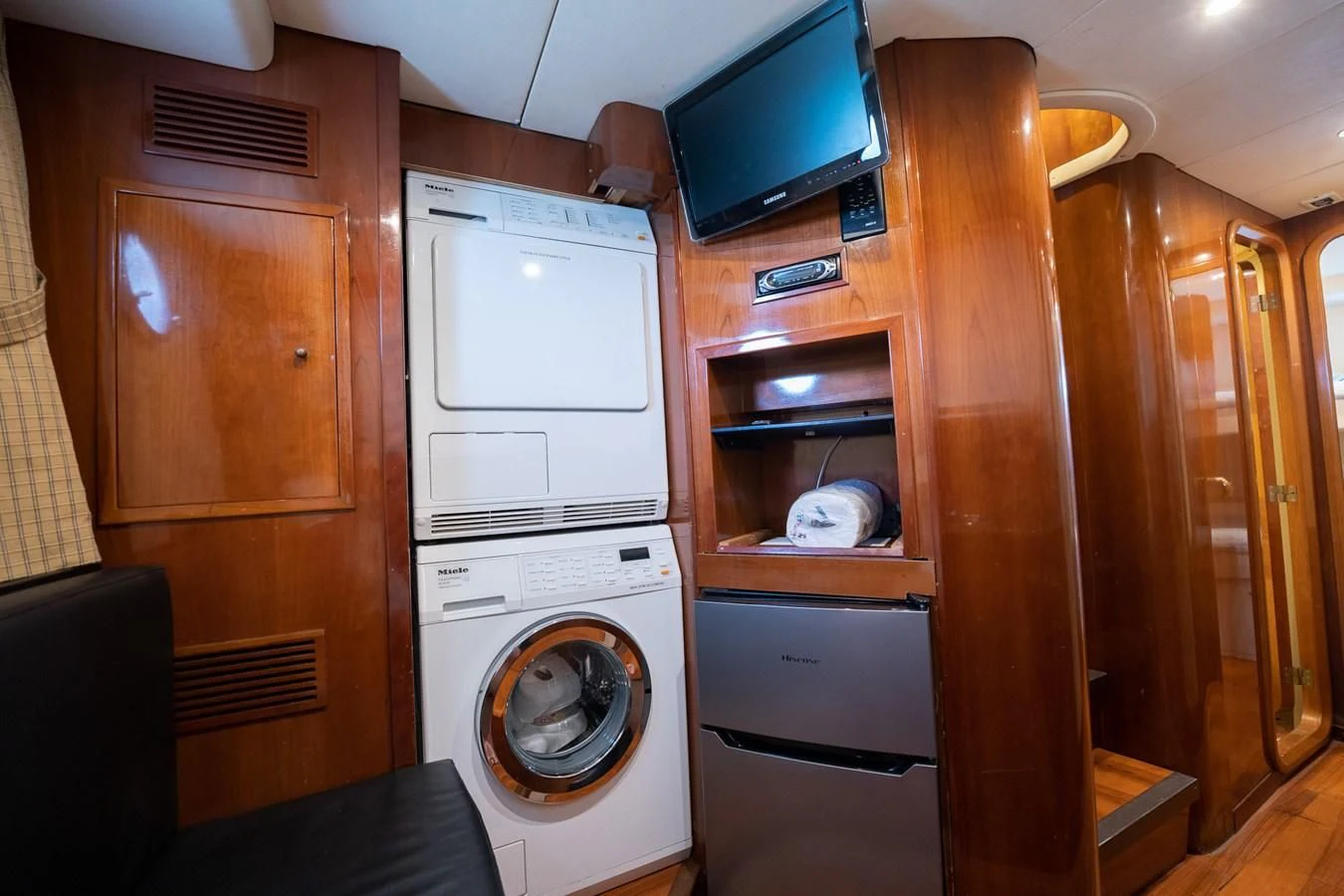 a room with a washer and dryer aboard 80 CARAT Yacht for Sale
