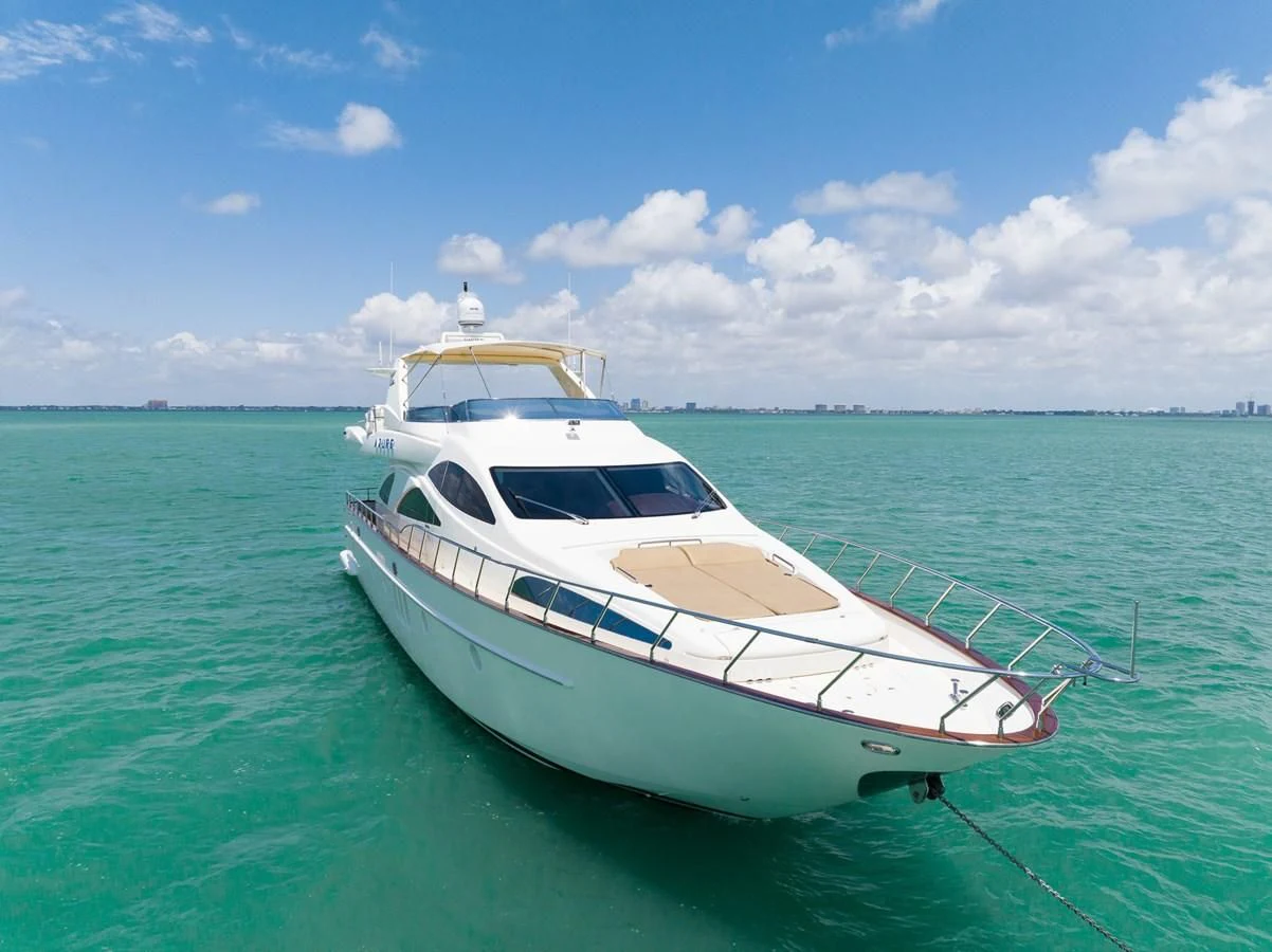 a white boat in the water aboard 80 CARAT Yacht for Sale