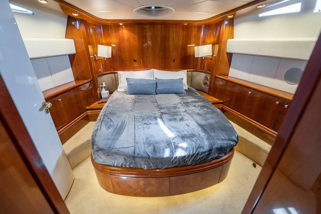 a bed in a room aboard 80 CARAT Yacht for Sale