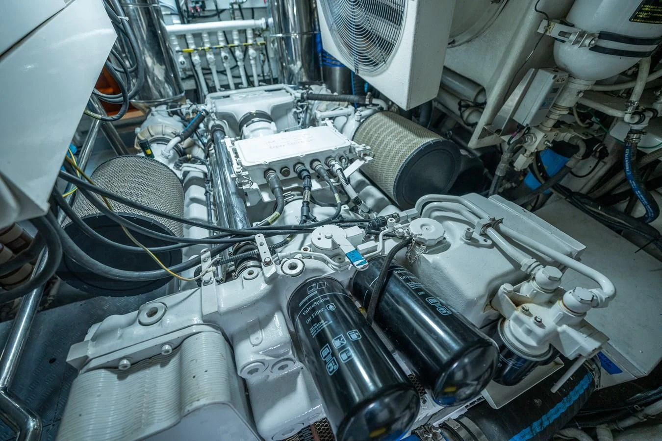 a car engine with many wires aboard 80 CARAT Yacht for Sale