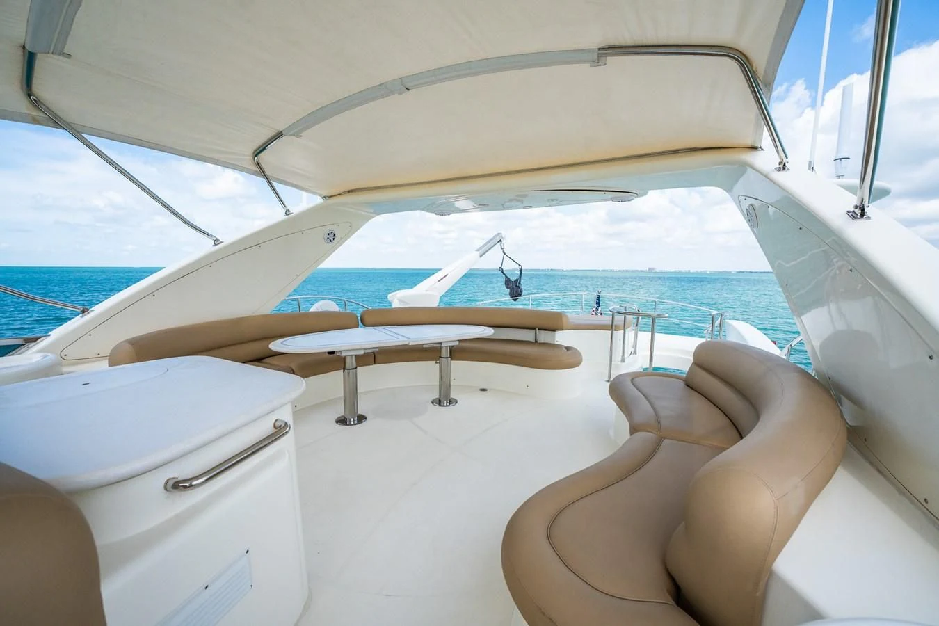 a person sitting on a boat aboard 80 CARAT Yacht for Sale
