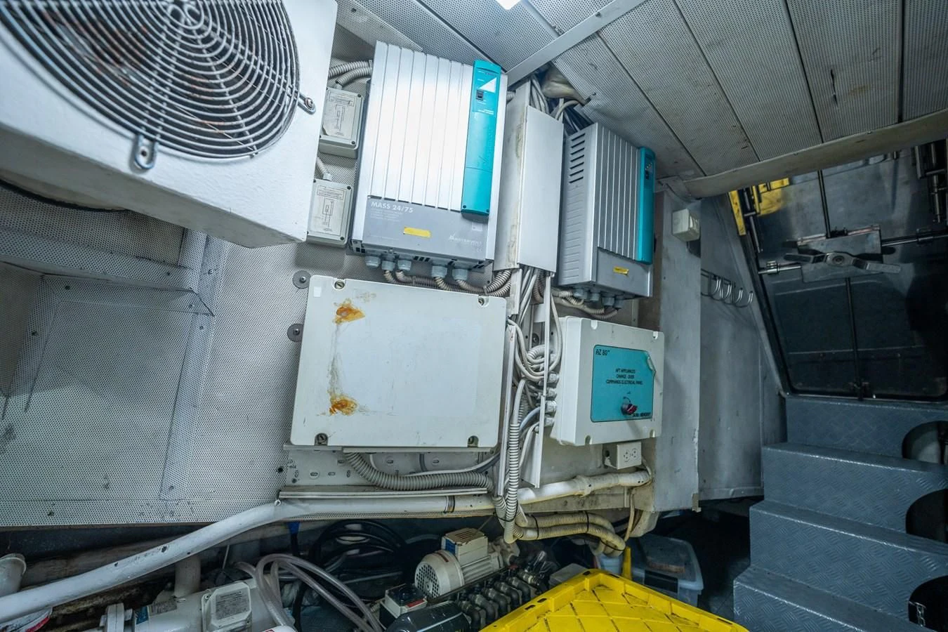 a large white machine with blue lights aboard 80 CARAT Yacht for Sale