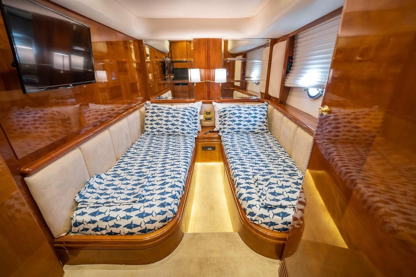 a room with a large mirror aboard 80 CARAT Yacht for Sale