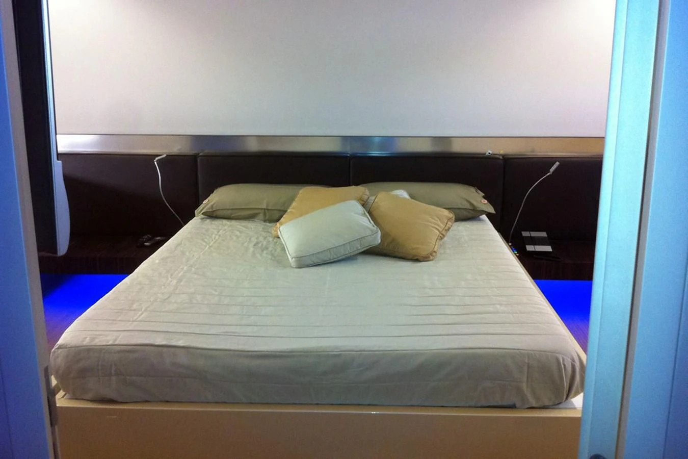 a bed with white sheets aboard MIKYMAR Yacht for Sale
