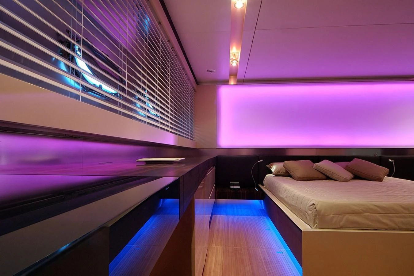 a room with a bed and a window aboard MIKYMAR Yacht for Sale