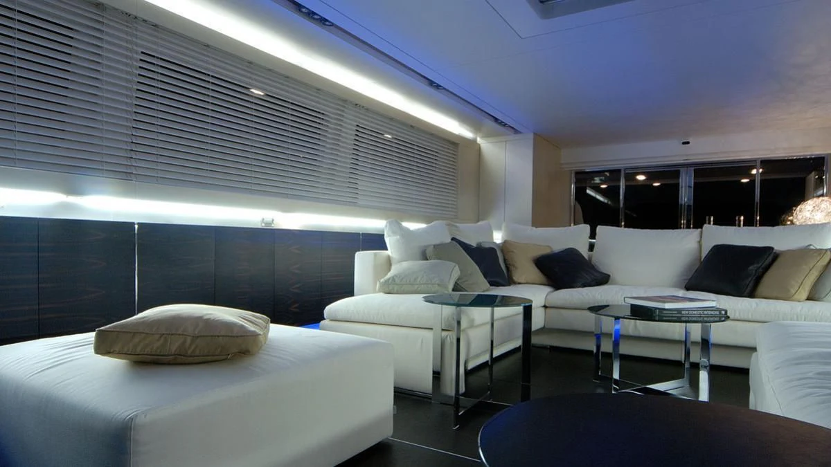a room with a bed and a table aboard MIKYMAR Yacht for Sale