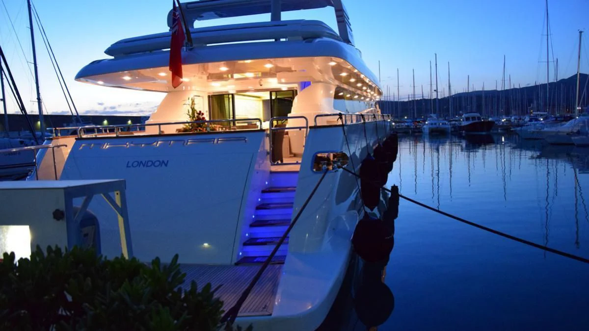 a boat docked at a pier aboard MIKYMAR Yacht for Sale