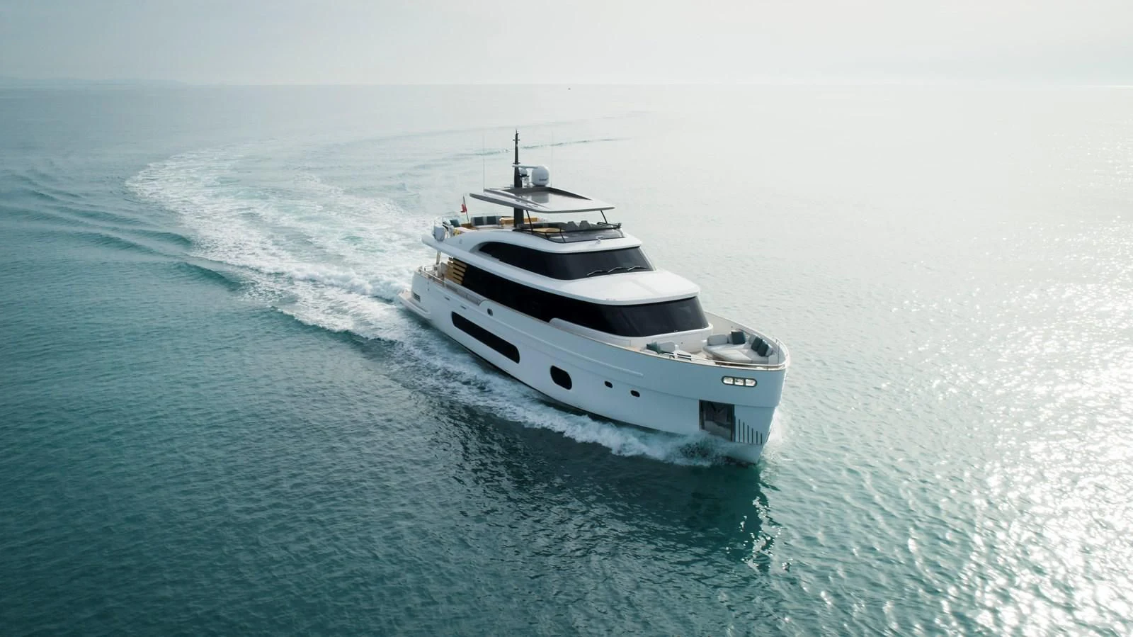 a white boat in the water aboard ANDALA Yacht for Sale