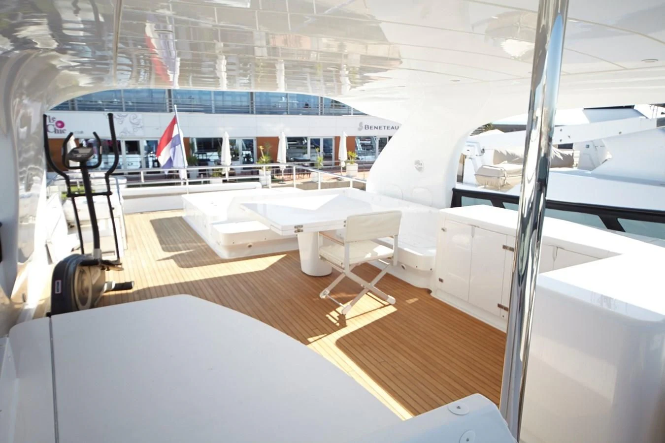 a room with a large mirror and a large white boat aboard GULU Yacht for Sale