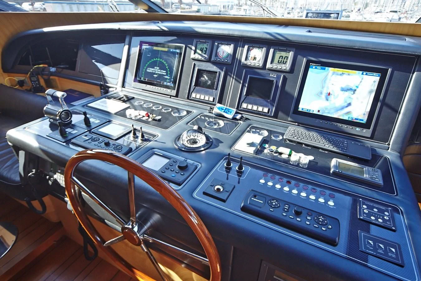 a room with many electronic devices aboard GULU Yacht for Sale