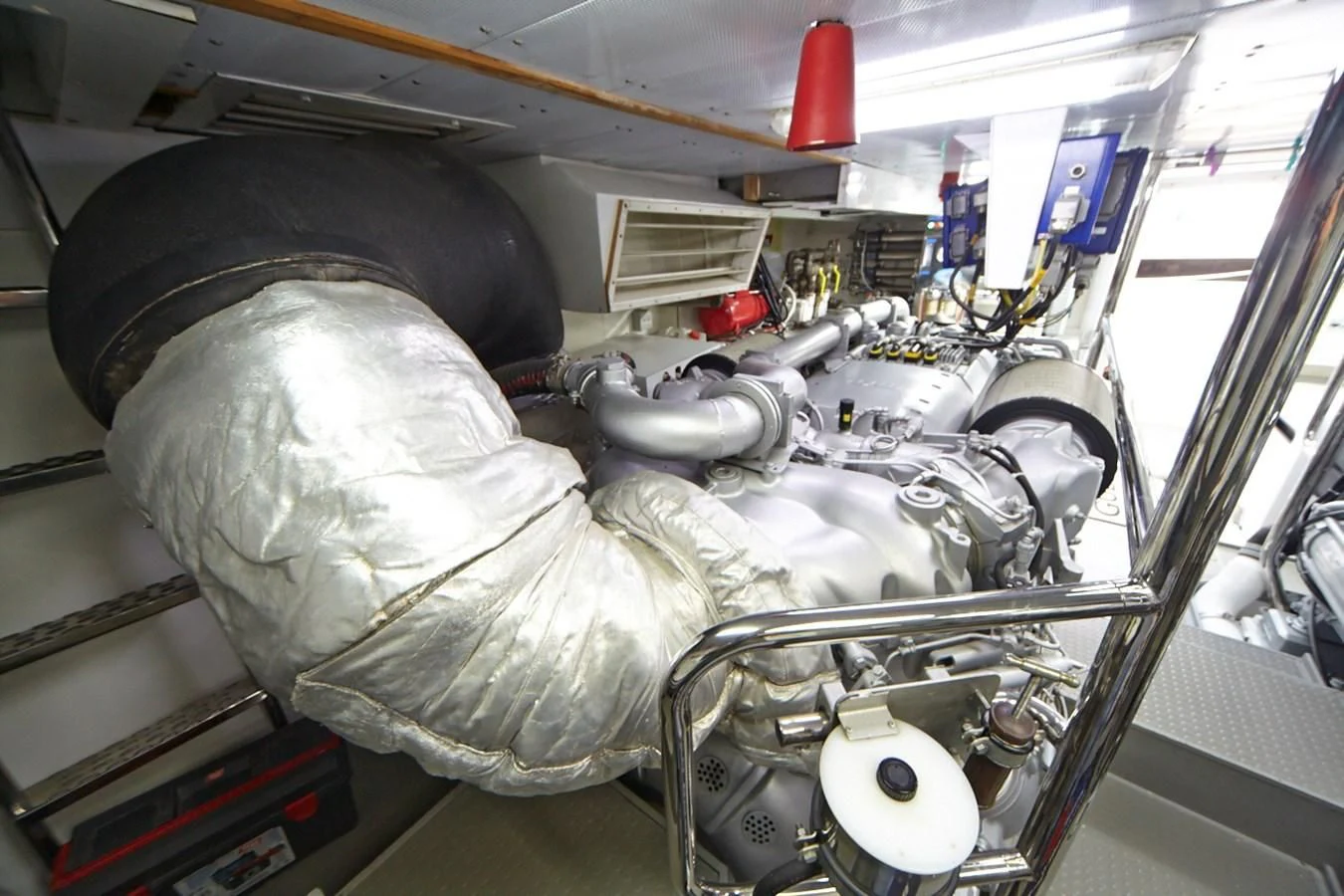 a person working on a car aboard GULU Yacht for Sale