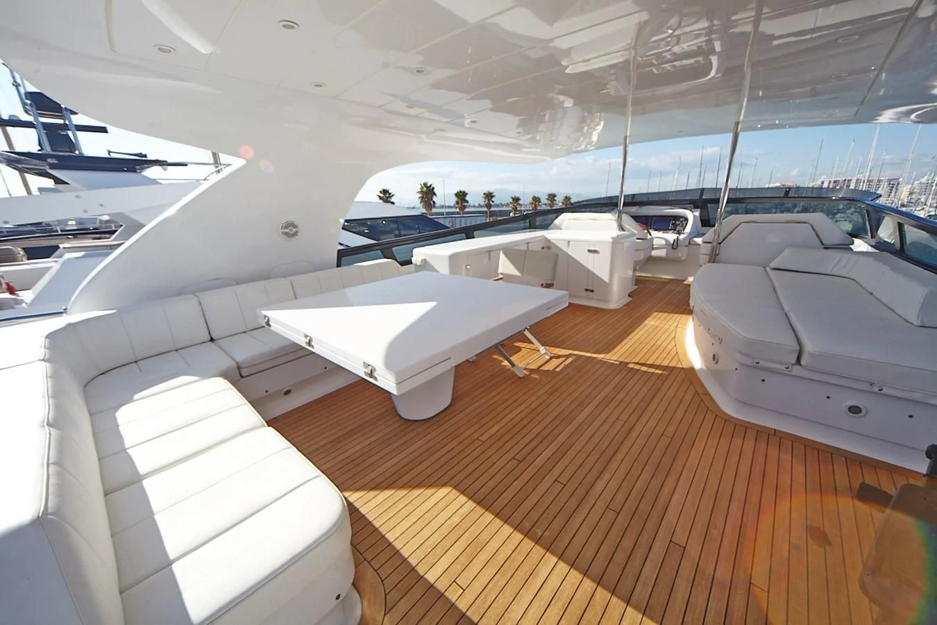 a boat with a deck and a bench in it aboard GULU Yacht for Sale
