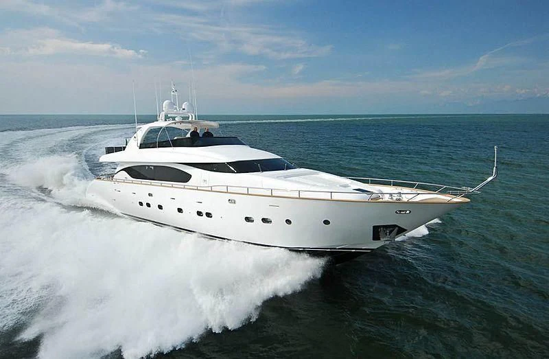 a white yacht on the water aboard GULU Yacht for Sale