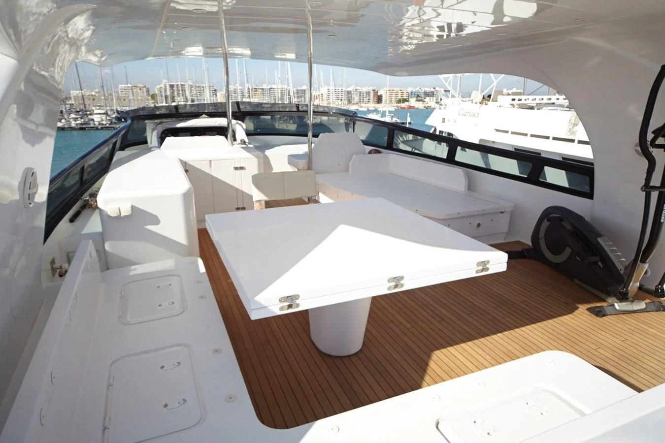 a room with a table and chairs aboard GULU Yacht for Sale