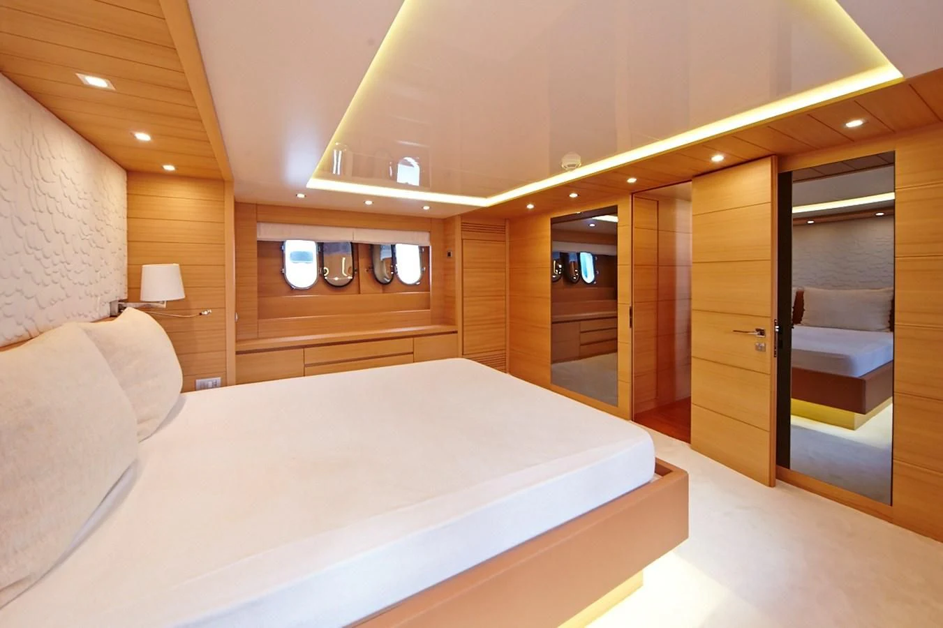 a bed in a hotel room aboard GULU Yacht for Sale