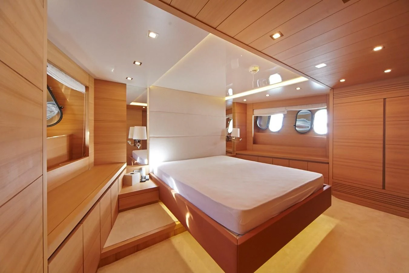 a large bathroom with a large bed aboard GULU Yacht for Sale