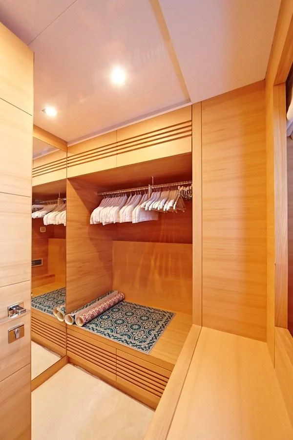a room with a wood floor and a wood door aboard GULU Yacht for Sale