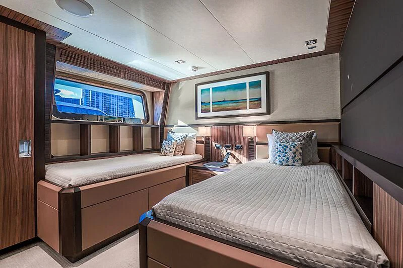 a couple of beds in a room aboard ARIES Yacht for Sale