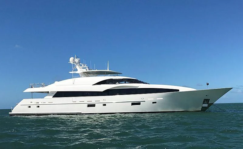 a white yacht in the water aboard ARIES Yacht for Sale