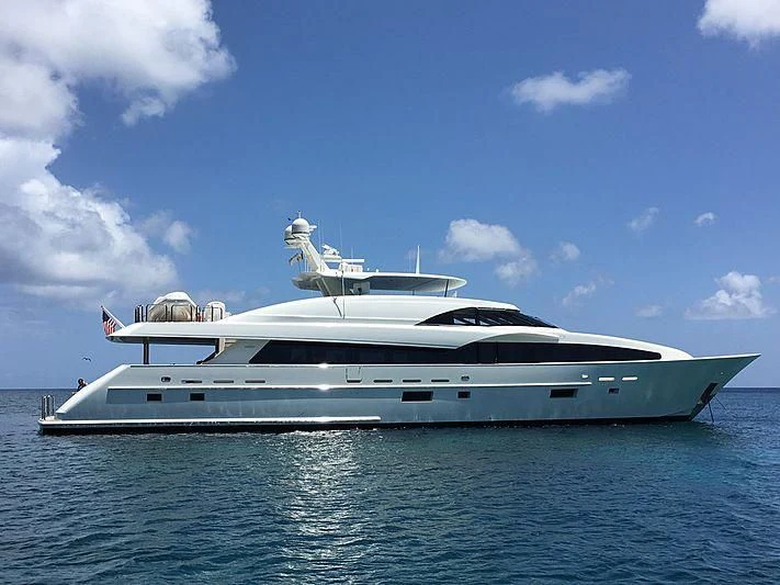a white yacht on the water aboard ARIES Yacht for Sale