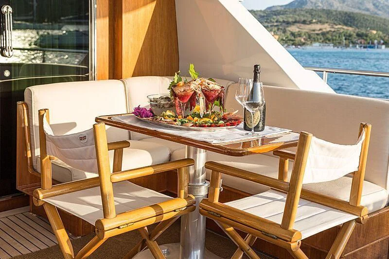a table with food on it aboard PIERPAOLO IV Yacht for Sale