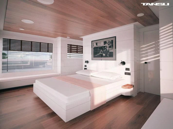 a room with a bed and a window aboard GREY Yacht for Sale