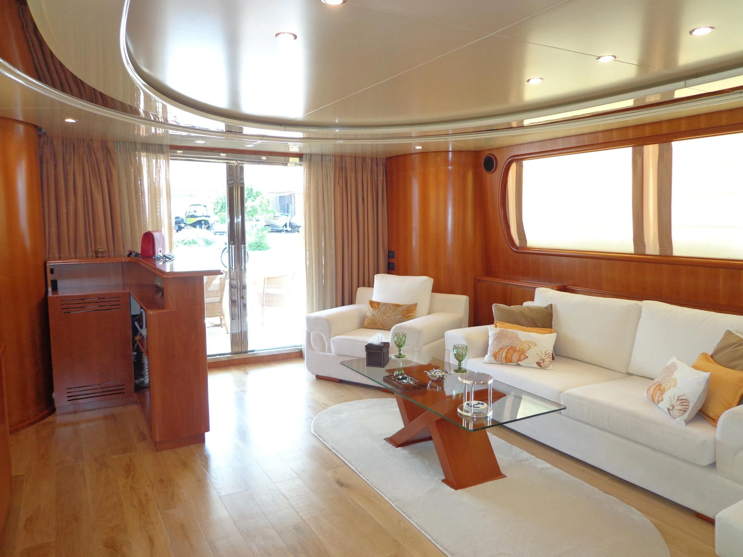 a living room with a couch and a table aboard MARACANA Yacht for Sale