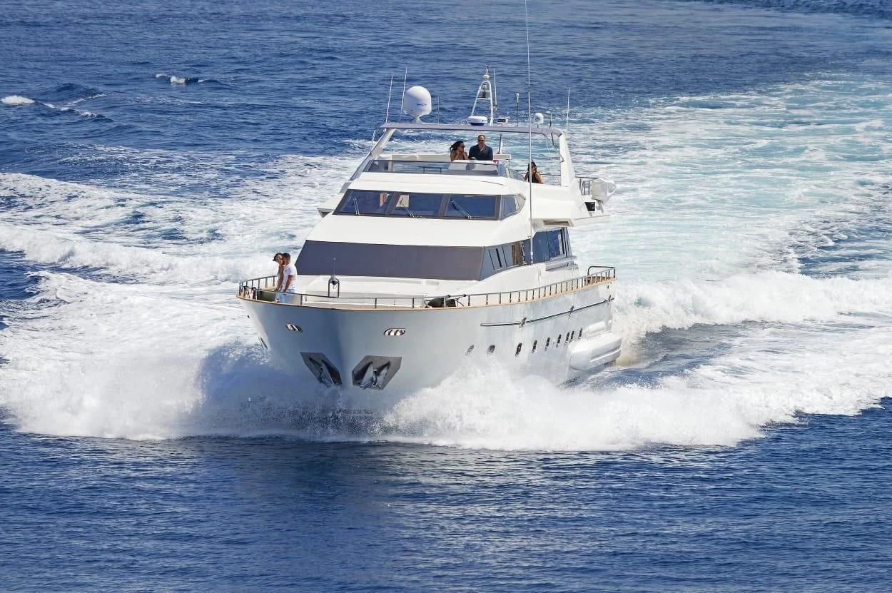 a white boat with people on it aboard MARACANA Yacht for Sale
