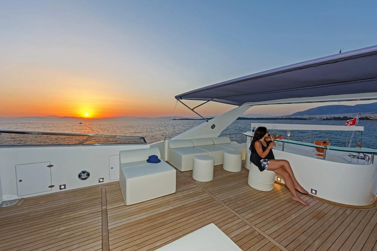 a couple kissing on a deck of a boat aboard MARACANA Yacht for Sale