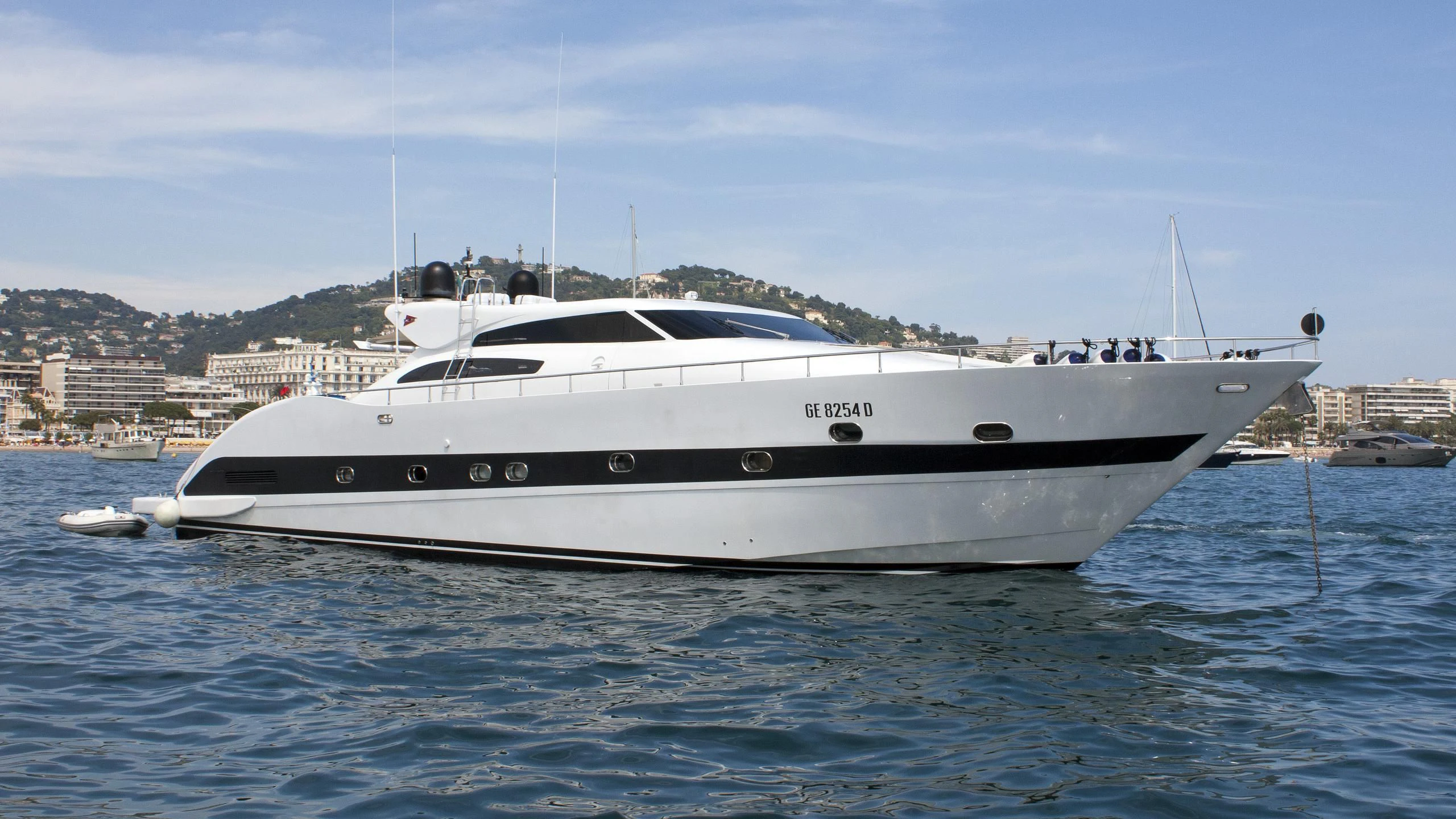 a white yacht in the water aboard MARACANA Yacht for Sale