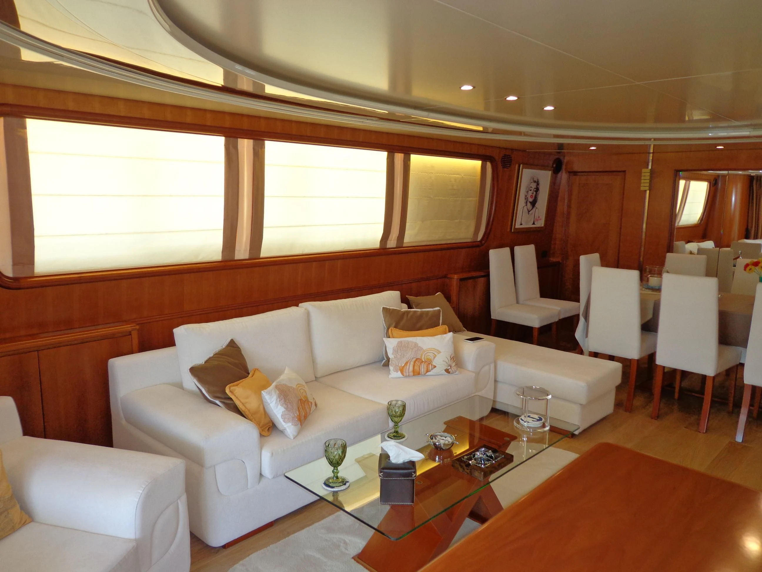 a living room with a couch and a coffee table aboard MARACANA Yacht for Sale