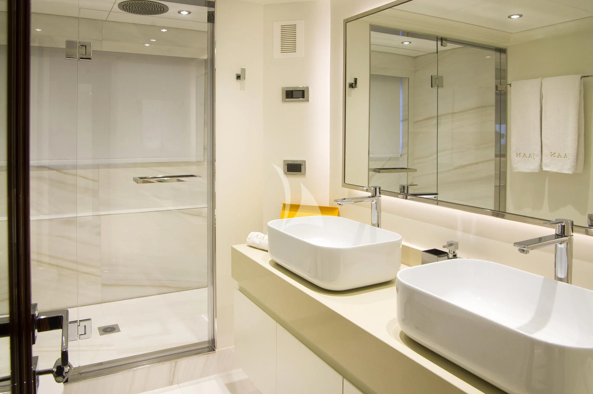 a bathroom with a large mirror aboard JAAN Yacht for Sale