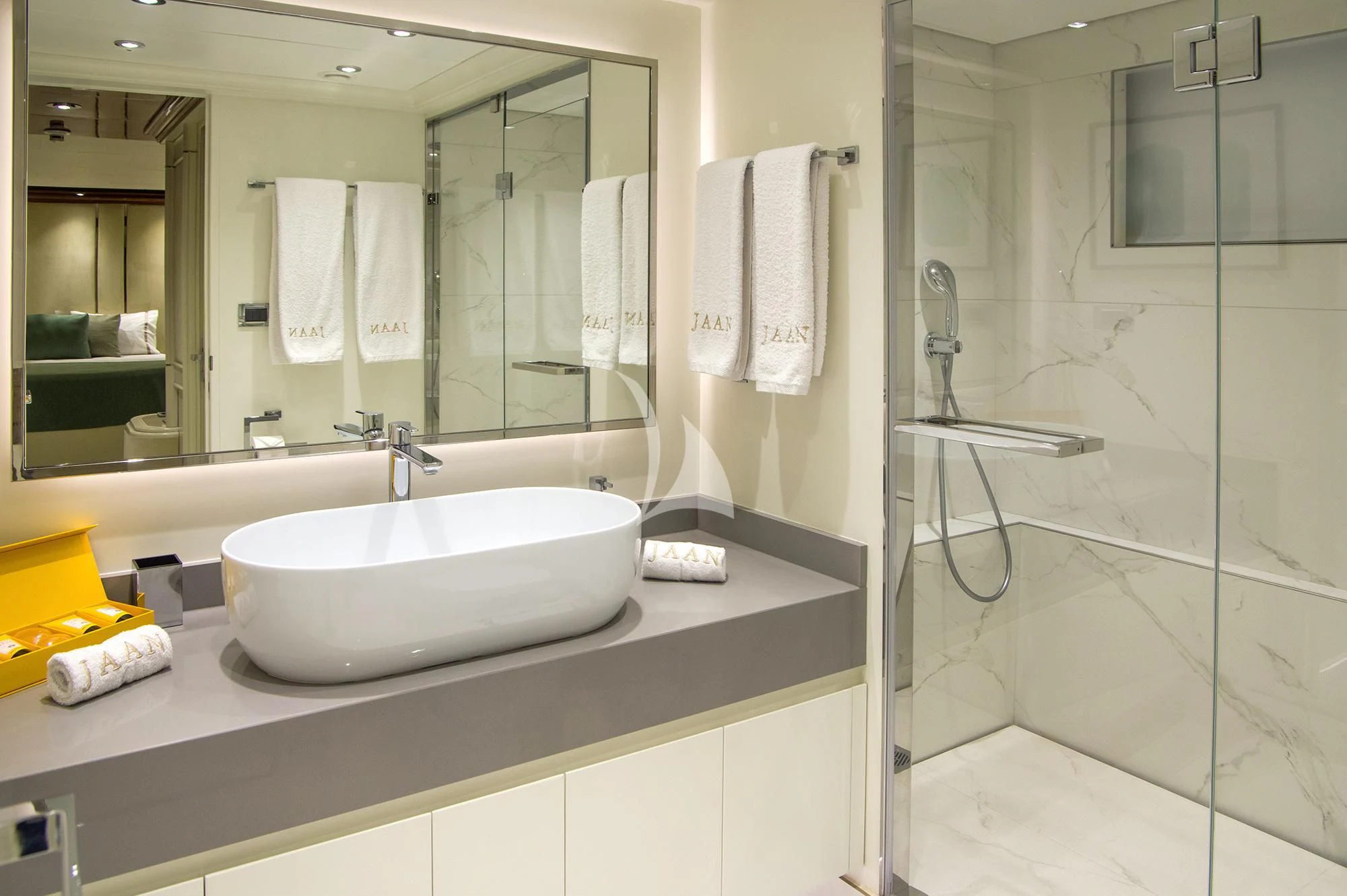 a bathroom with a large mirror aboard JAAN Yacht for Sale