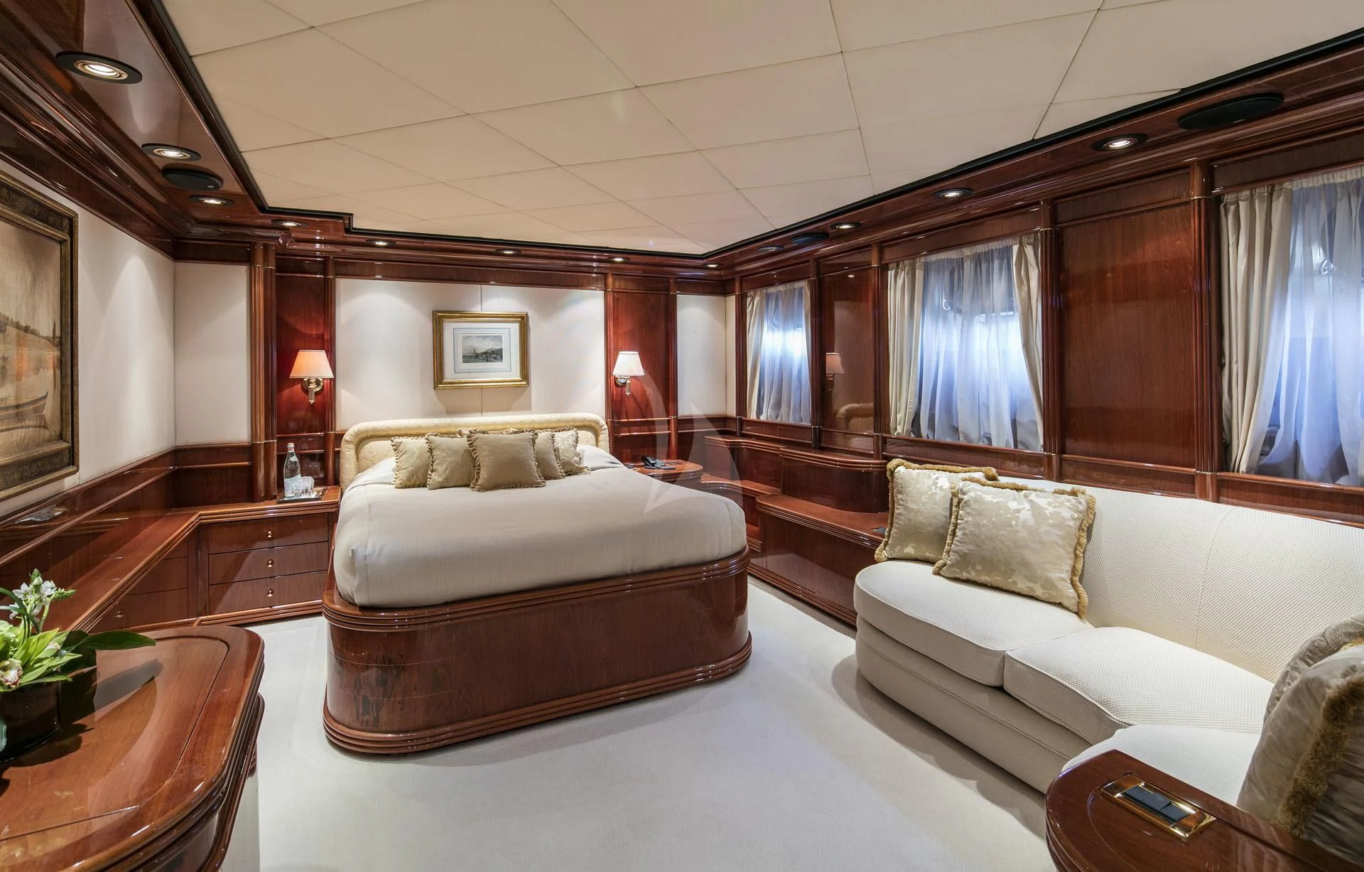 a living room with a couch and a table aboard JAAN Yacht for Sale
