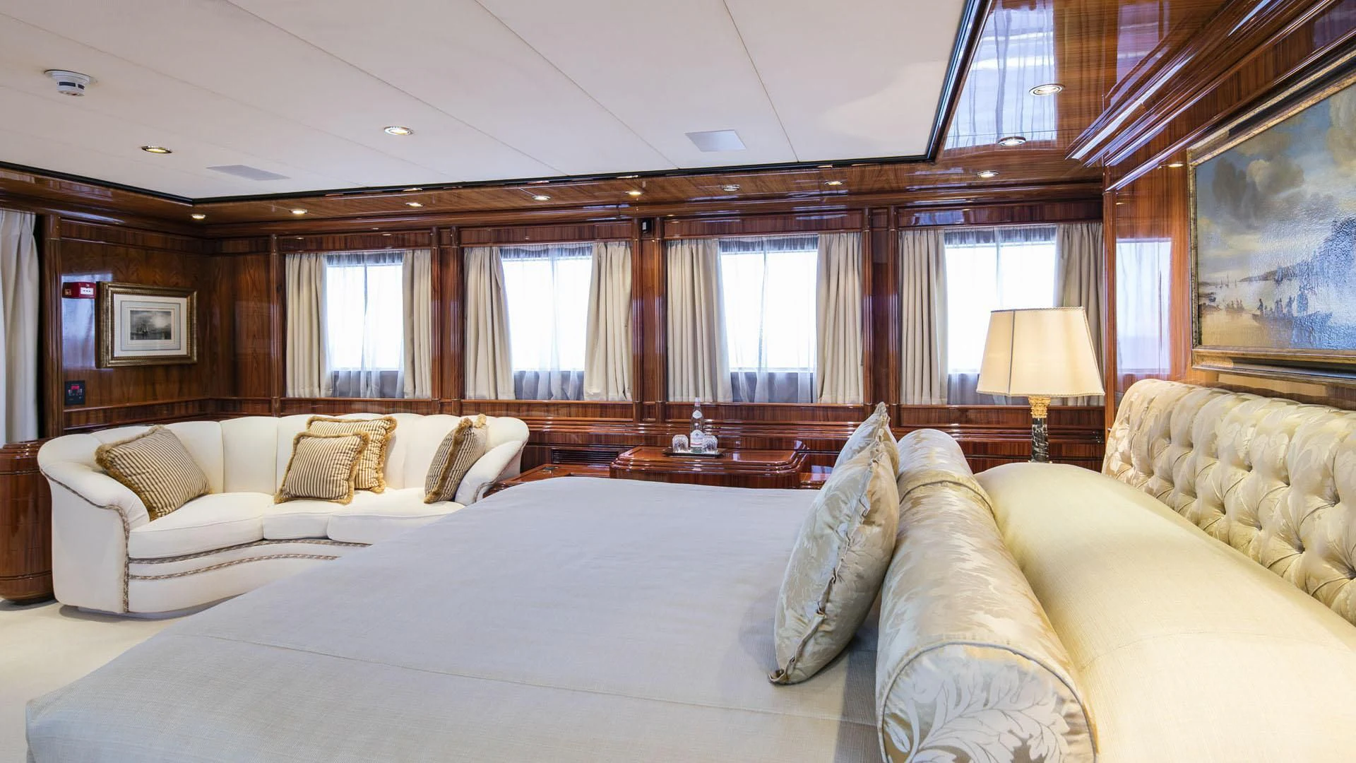 a large bed in a hotel room aboard JAAN Yacht for Sale