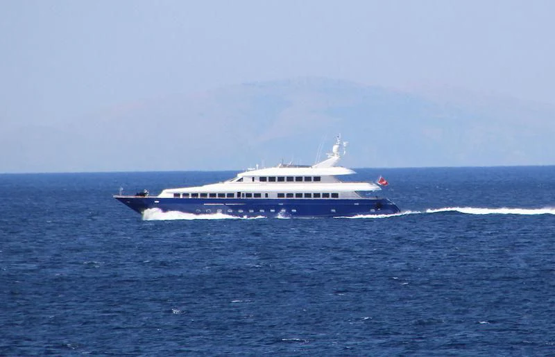 a large white boat in the water aboard JAAN Yacht for Sale