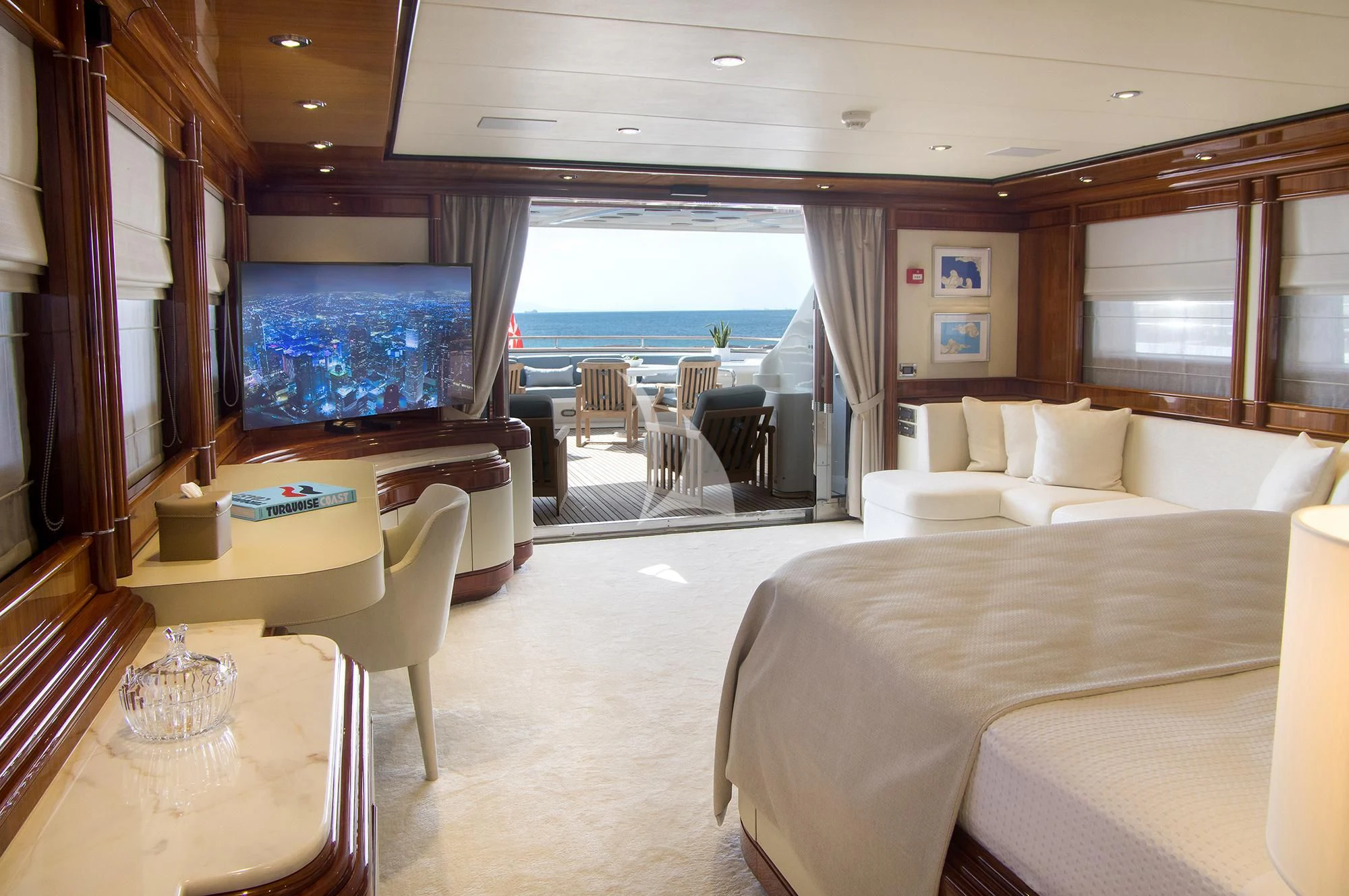 a hotel room with a balcony aboard JAAN Yacht for Sale