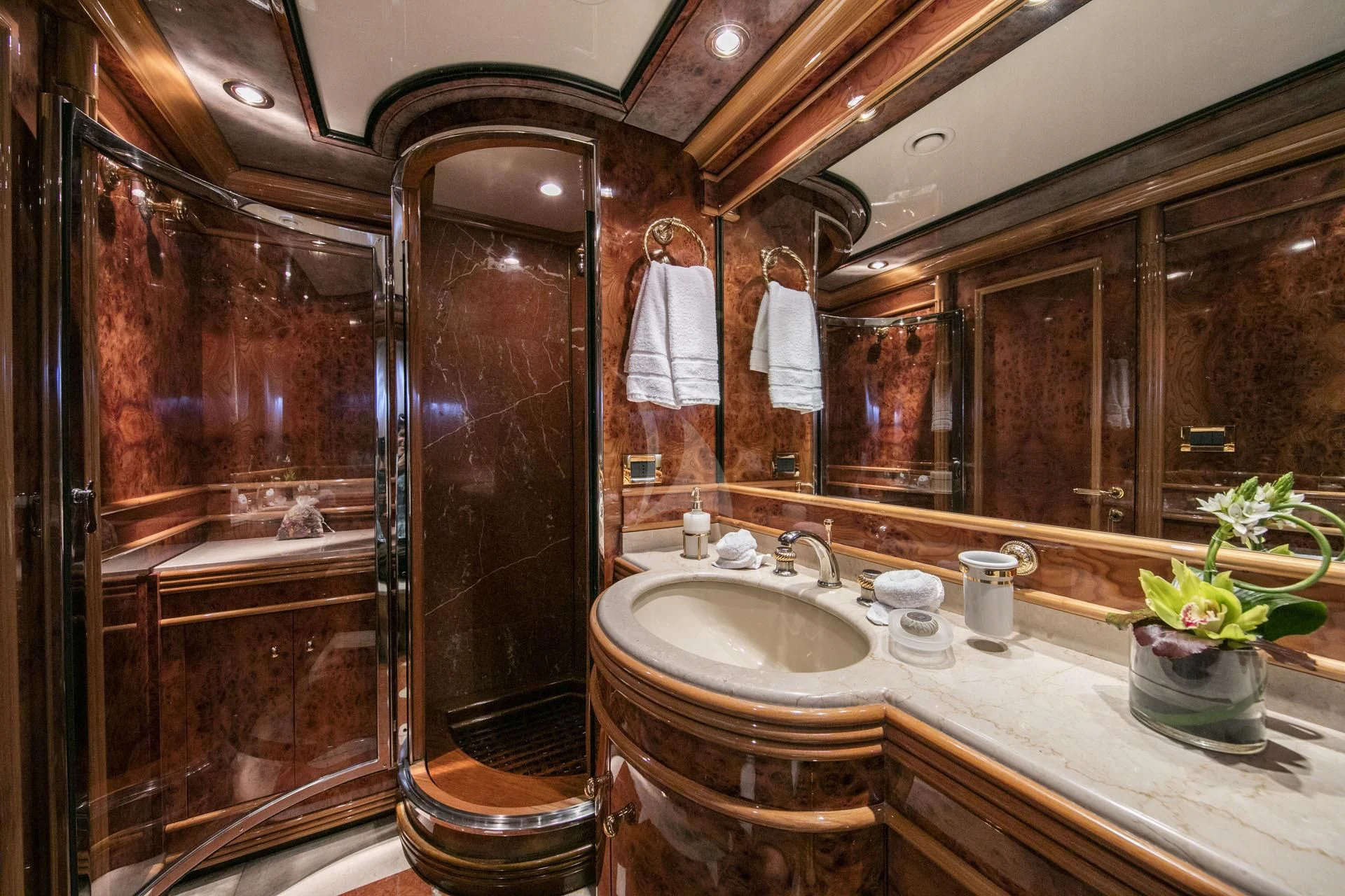 a bathroom with a large mirror aboard JAAN Yacht for Sale