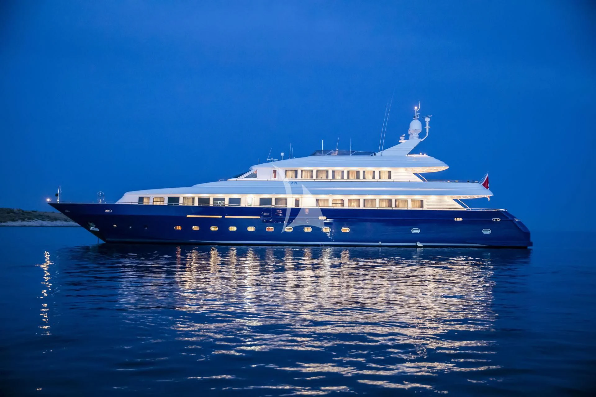 a large white and black boat on water aboard JAAN Yacht for Sale