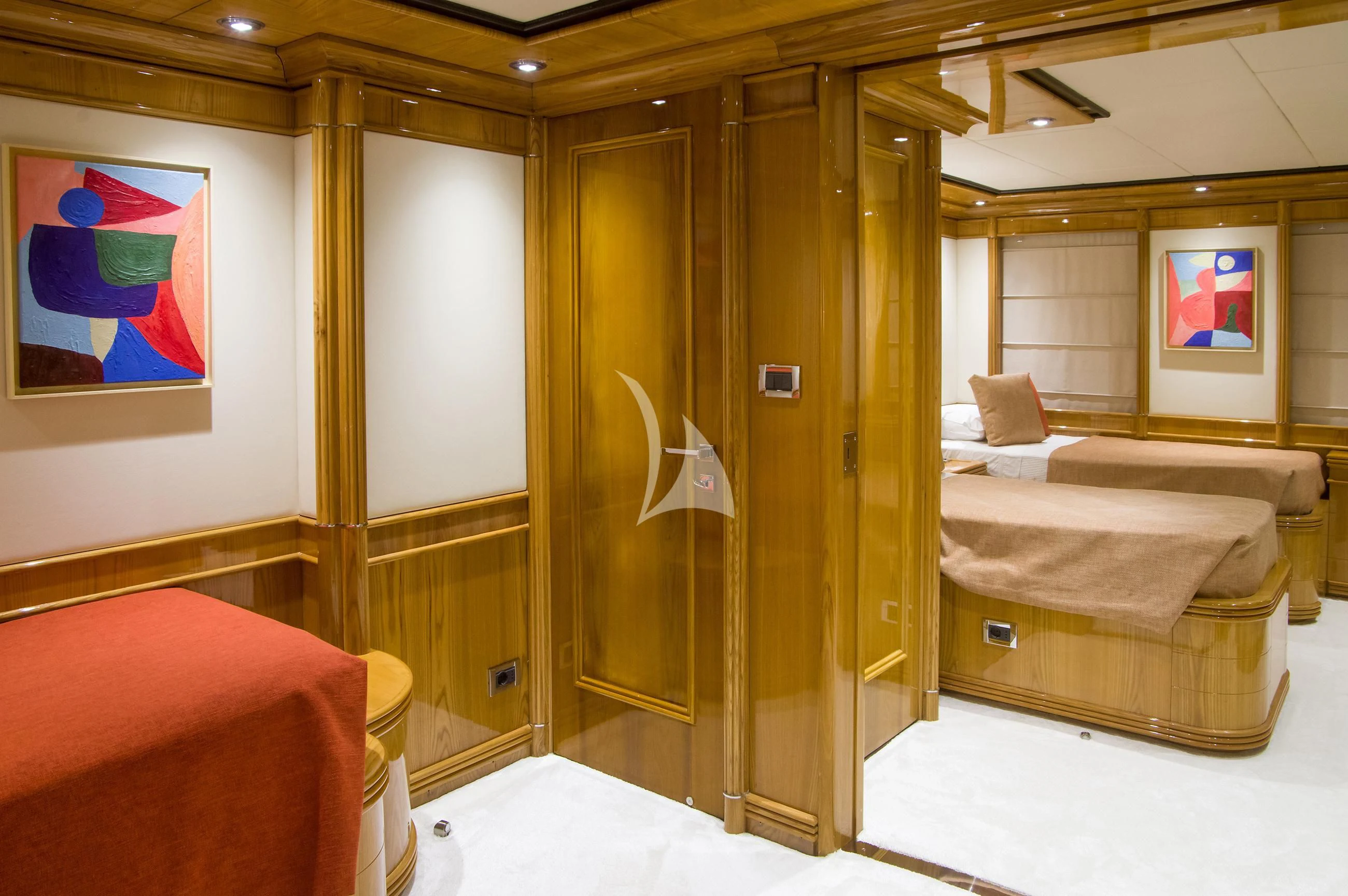 a room with a bed and a mirror aboard JAAN Yacht for Sale