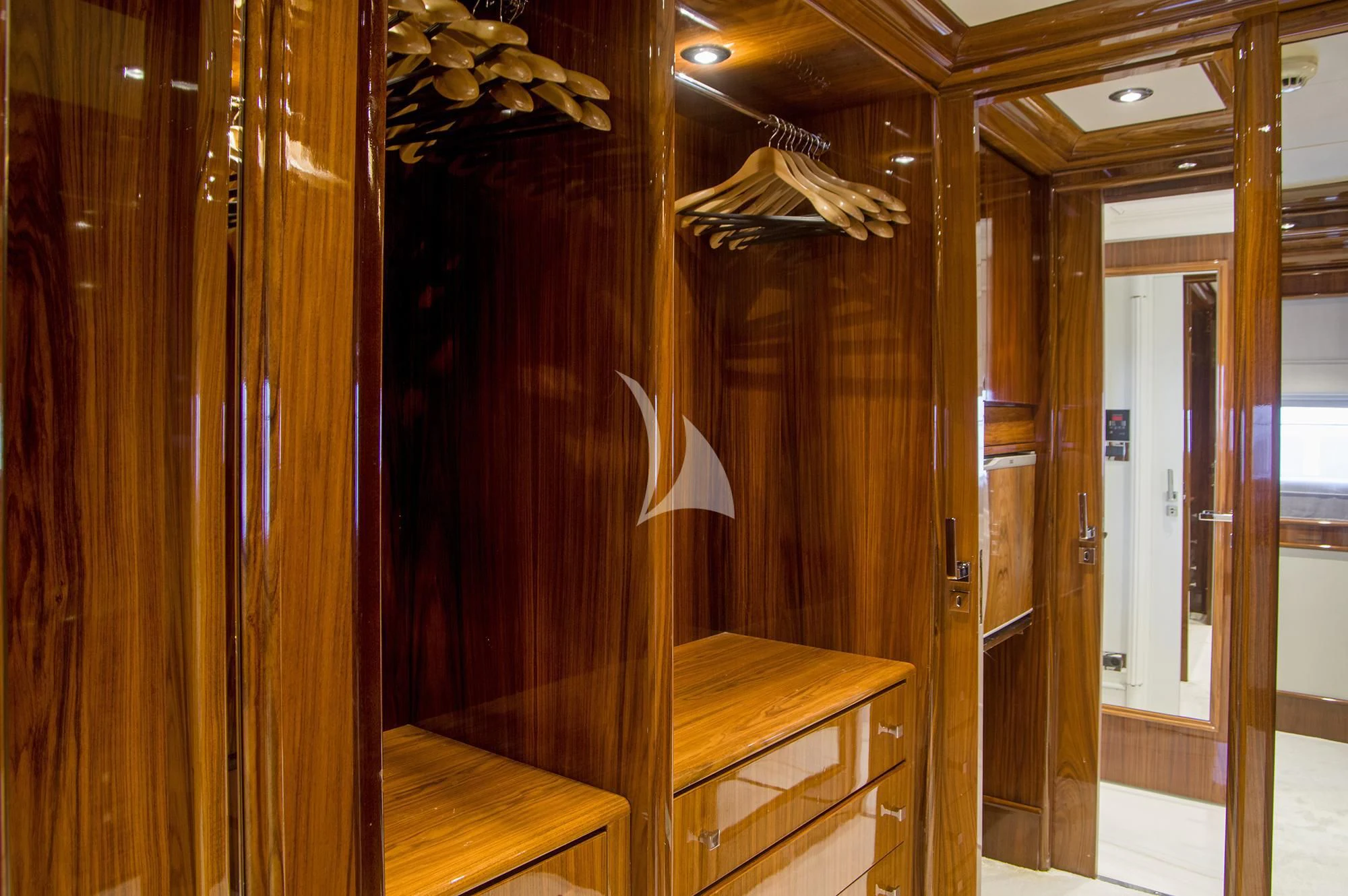 a room with wood cabinets aboard JAAN Yacht for Sale